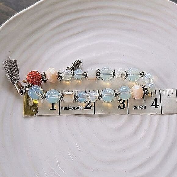 Mixed bead tassle charm stretch bracelet - Picture 4 of 4
